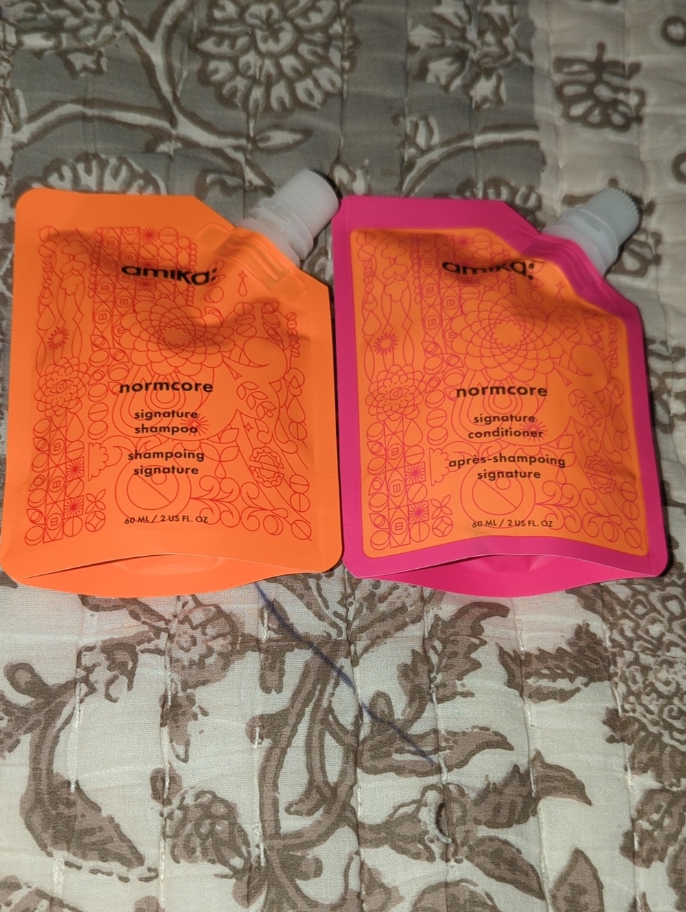 amika Normcore Travel Shampoo & Conditioner Pouches - Orange & Pink